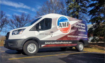 New AMP truck showcased in a parking lot.